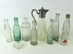 A collection of Victorian and later glass bottles,