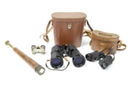 Three pairs of binoculars and a telescope,