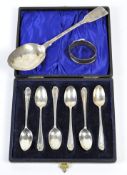A selection of early 20th century silver, comprising a set of six cake spoons,