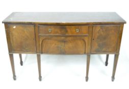 A 20th century mahogany sideboard, of serpentine form,