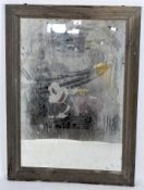 A vintage rectangular wall mirror with profiled wood frame, 93cm x 67.