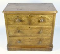 A late 19th/early 20th century mahogany chest of drawers, two short over two long drawers,