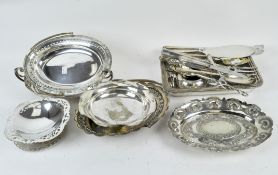 A collection of early 20th century silver plate, including pierced dishes, grape scissors,