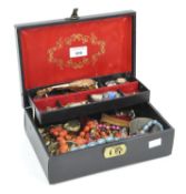 A collection of costume jewellery within a jewellery box, to include bangles, brooches, thimbles,