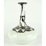 A Limoges ceramic vase, the cream body decorated with silver overlay in the form of flowers,