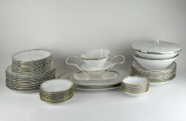 A German Rosenthal part dinner service decorated with light blue and gilt rims