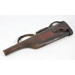 A vintage mutton leg gun case, the leather case with metal fastenings and catches,