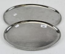 Two vintage Keswick School of Art Firth Staybrite serving trays, of oval form,