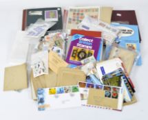 A collection of assorted stamps and stamp albums, featuring British and overseas examples