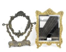 Two gilt metal framed dressing table mirrors, one on swing base, the other with bevelled edge,