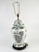 A large Chinese style ceramic lamp, decorated with birds, flowers and foliage,