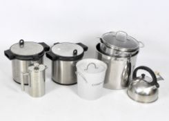 A quantity of stainless steel cookware
