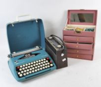 A vintage Roberts radio, typewriter and jewellery box