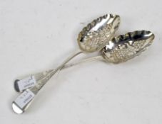 A pair of Georgian silver grape spoons, hallmarked London 1820,