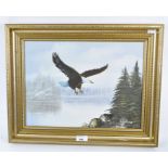 A 20th century oil on canvas depicting a bald eagle in flight over a wintery lake landscape,