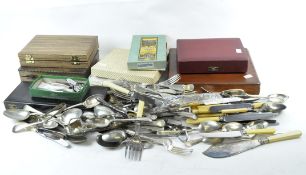 A selection of silver plated flatware, including a set of six spoons, canteen, and more