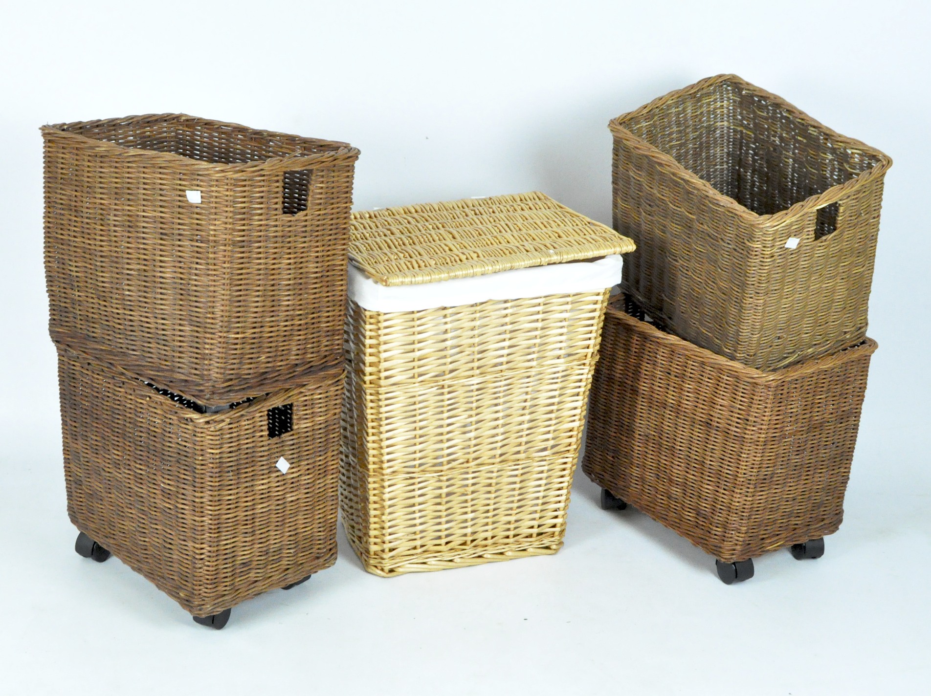 Five modern wicker baskets to include four matching examples and a ...