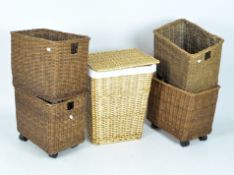 Five modern wicker baskets to include four matching examples and a linen basket