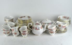 A part Colclough tea and dinner service comprising cups and saucers, various plates, bowls, teapot,