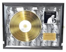 A Nat King Cole 'Unforgettable' limited edition disc, coated in 24ct gold and numbered 5/1500,