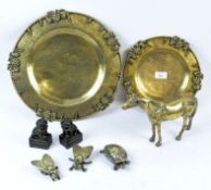 A group of brass and metalware comprising two chargers decorated with fruitiing vines,