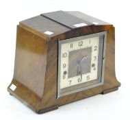 An Art Deco mahogany veneered mantle clock by Norland,