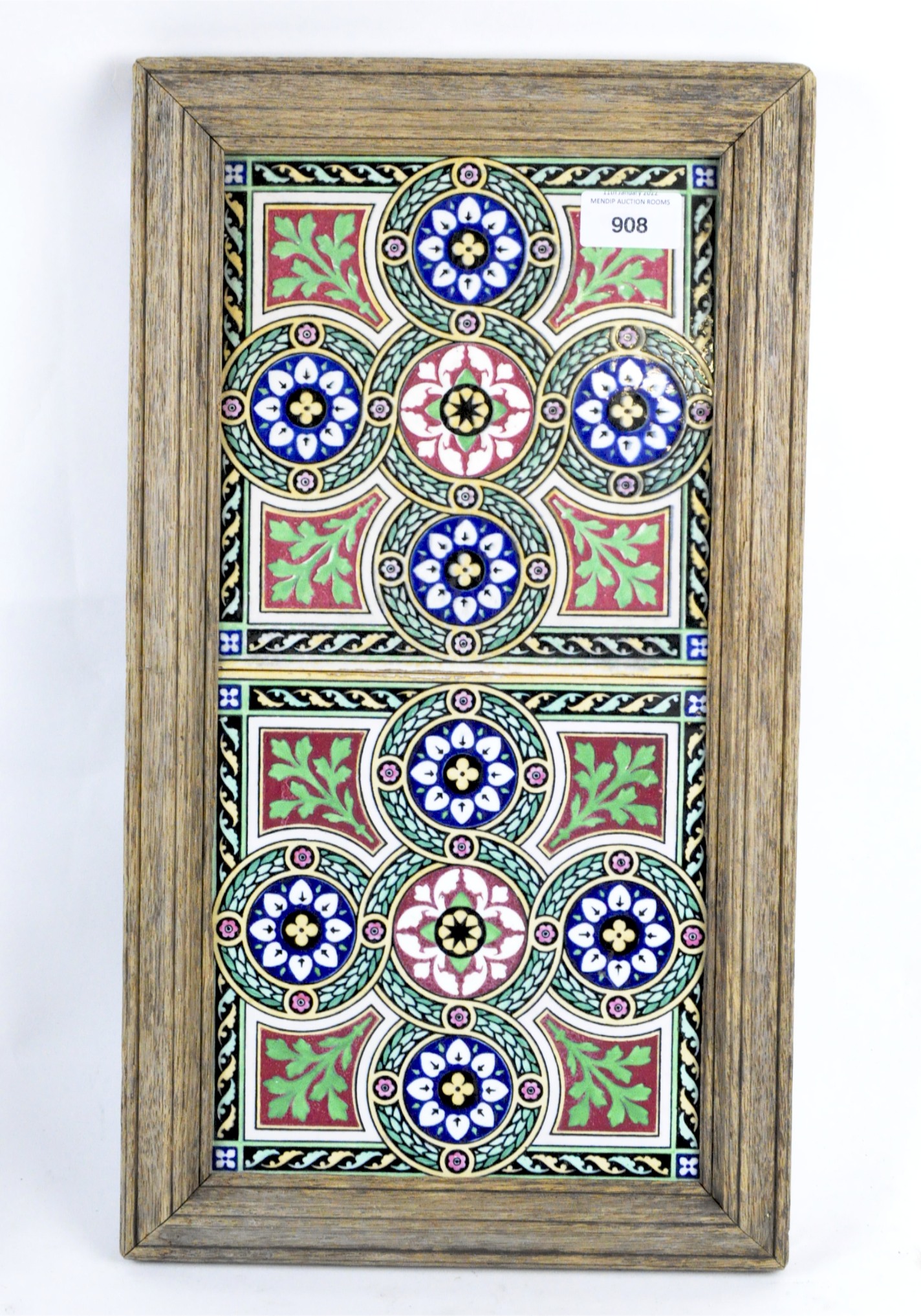 A Minton Stoke-on-Trent tile stand, the two tiles featuring entwined flowers,