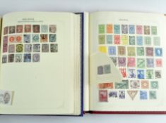 Two 20th century stamp albums containing a selection of GB and Rest of the world stamps,