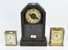 An early 20th century mantle clock, and two contemporary quartz carriage clocks