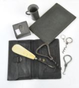 An assortment of collectables, to include a vintage shoe horn/sewing hook, pewter measure,