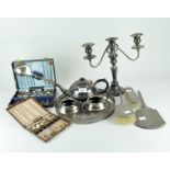 A selection of 20th century silver plated wares, to include a candlestick, brushes, a hand mirror,