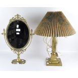 A table lamp and dressing table swing mirror,