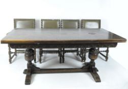 An early 20th century extendable wooden refectory table,