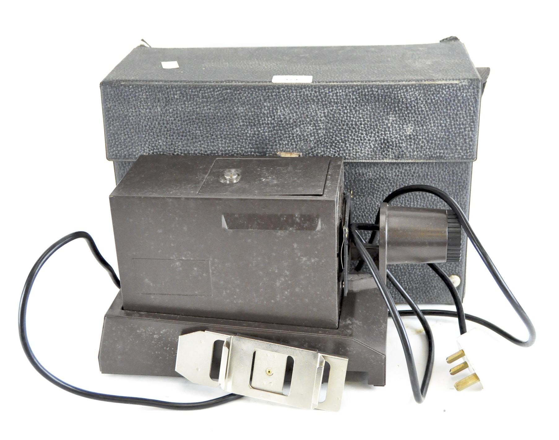 A vintage Luxar film projector in original case, f:1/2,8 F=85mm lens