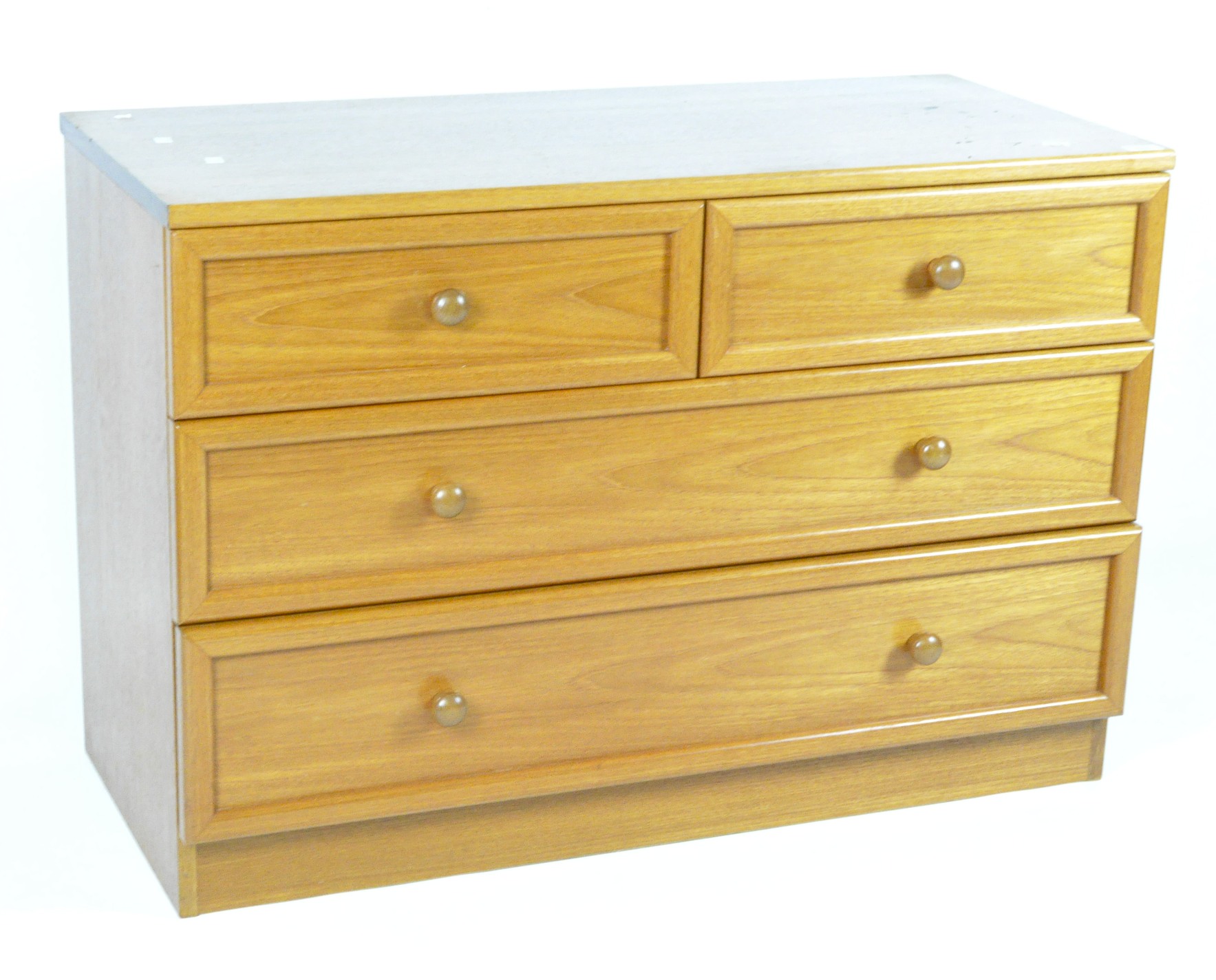 A wooden chest of drawers, composed of two short drawers over two longer ones,
