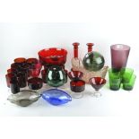 A collection of 20th century coloured glassware, including a set of ten red glasses,