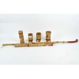 An unusual bamboo pipe, comprised of a number of components,