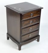 A Stag mahogany bedside chest of four drawers, 20th century, with four short drawers,