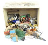 A collection of vintage toys, including farm animals,