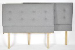 Two grey double bed headboards by sofa.com