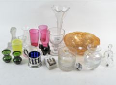 A collection of 20th century and later glassware, including a set of three red beakers,