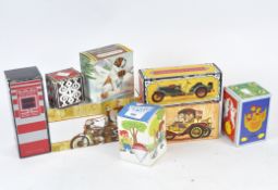 A selection of vintage novelty Avon perfume bottles, including Avon Packard Roadster,