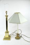Two 20th century brass standard lamps, the larger of columnaid form,