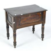 A rectangular mahogany side table with carved side panels and storage compartment