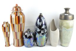 Six ceramic vases, of assorted sizes and designs,