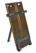 A vintage wooden press with metal hinges, labelled 'Supplied by Selfridge and Co London',