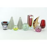 A collection of contemporary glass paperweights and two-colour vases,