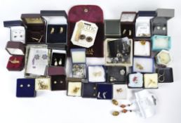 A collection of assorted vintage earrings, including stud and drop examples,