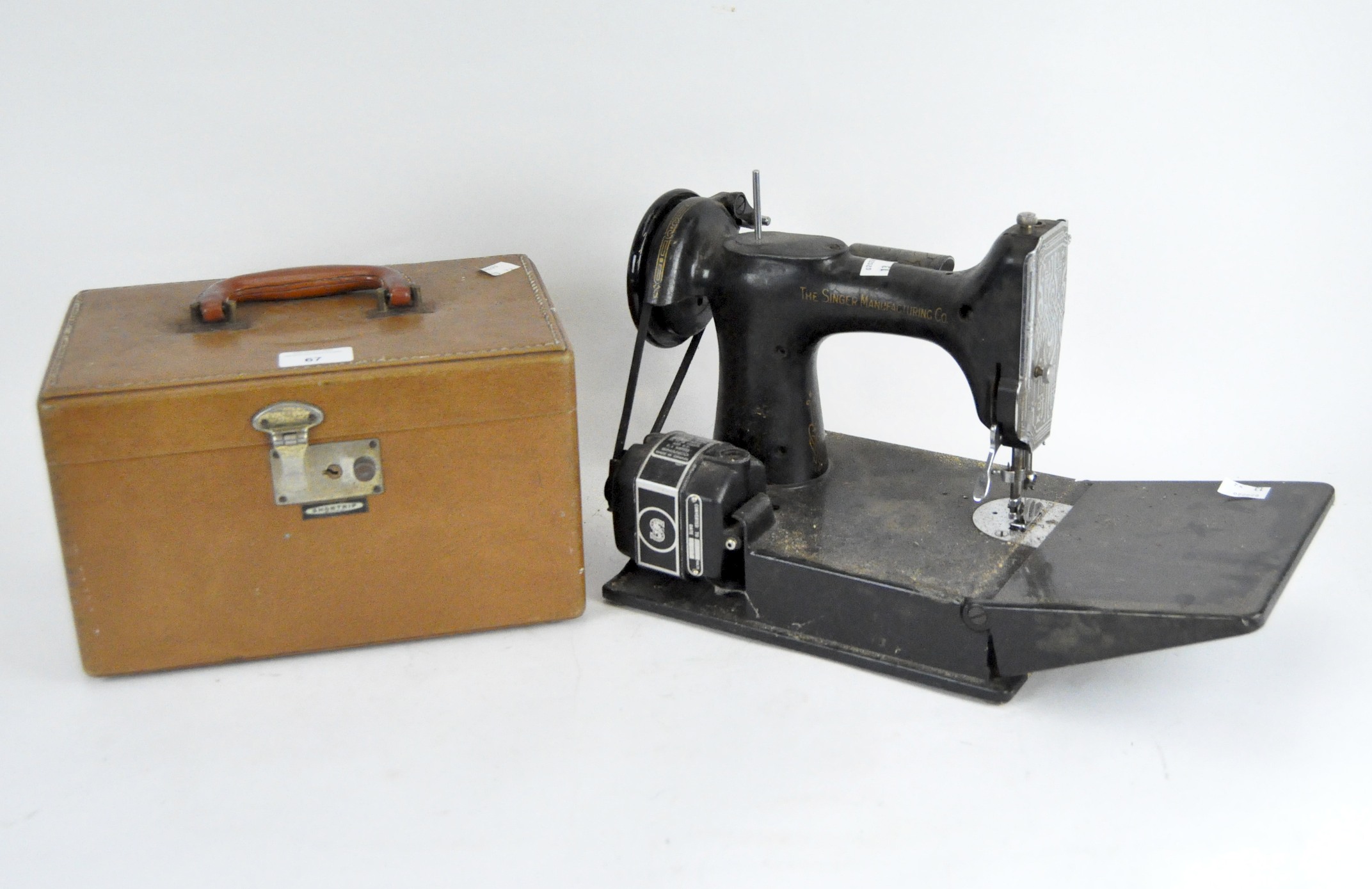A 20th century Singer sewing machine and a 'Shortrip' box,