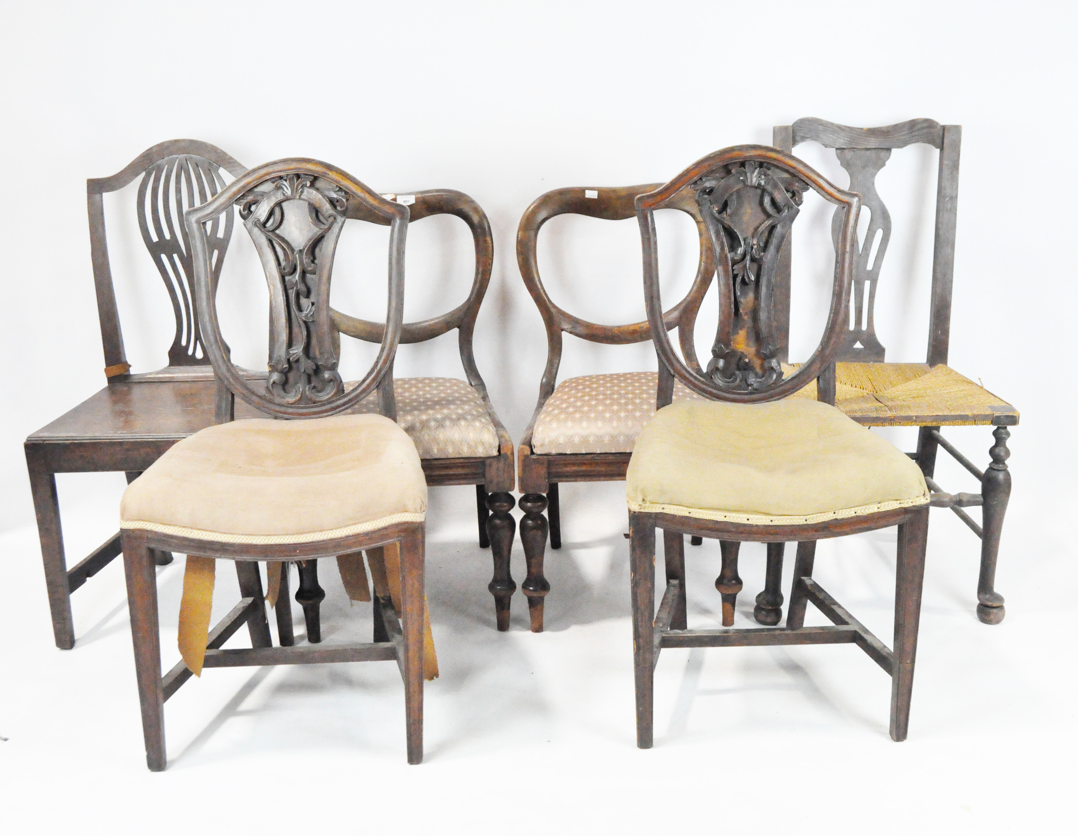 Six assorted dining chairs, including two balloon back chairs, two shield-backed,